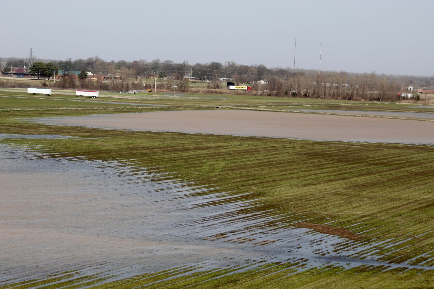 Rain causes soaked fields, road closures